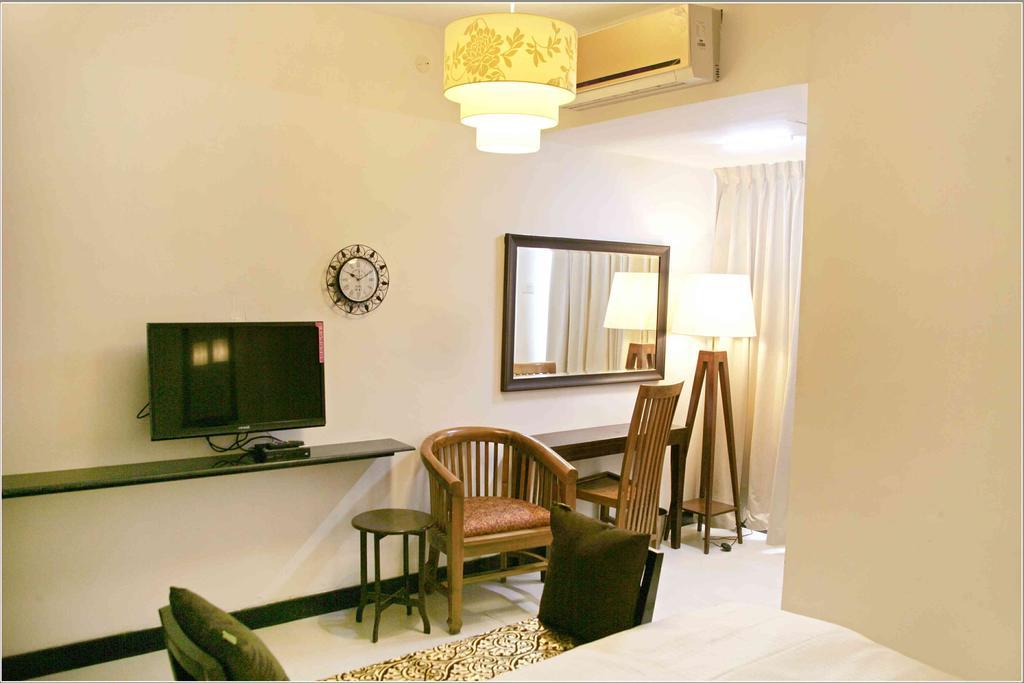 Hotel Highnest Singapperumalkovil Szoba fotó